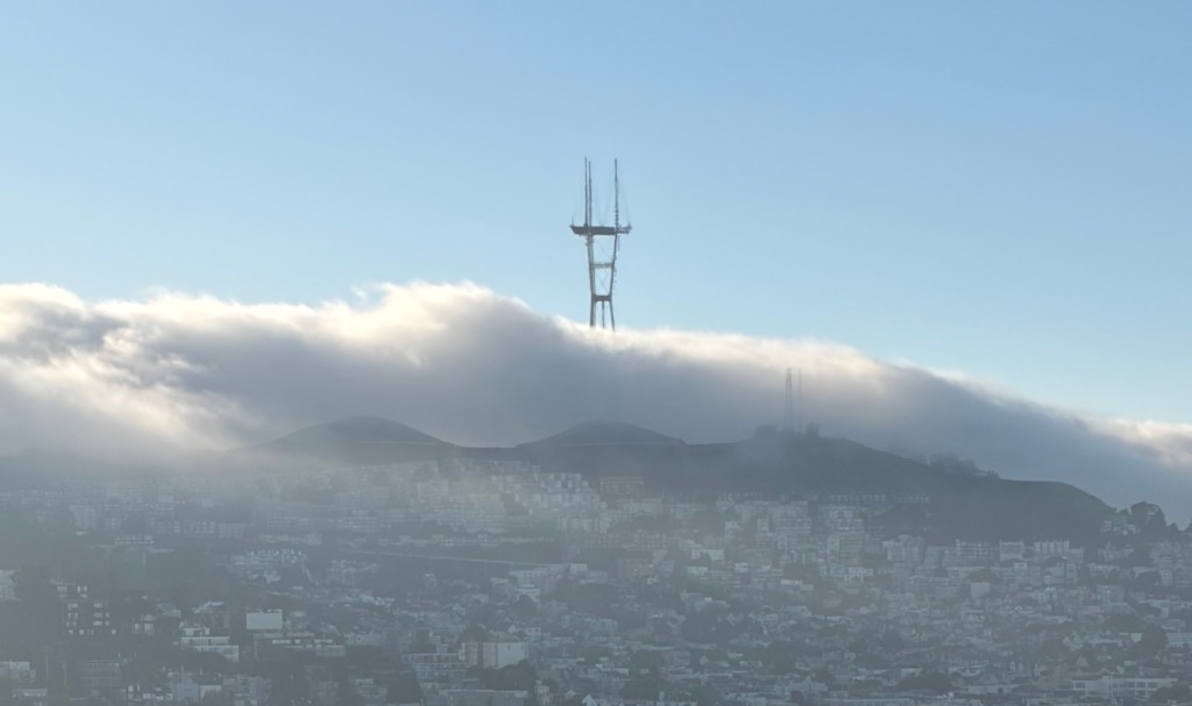 Sutro Tower rising above San Francisco fog